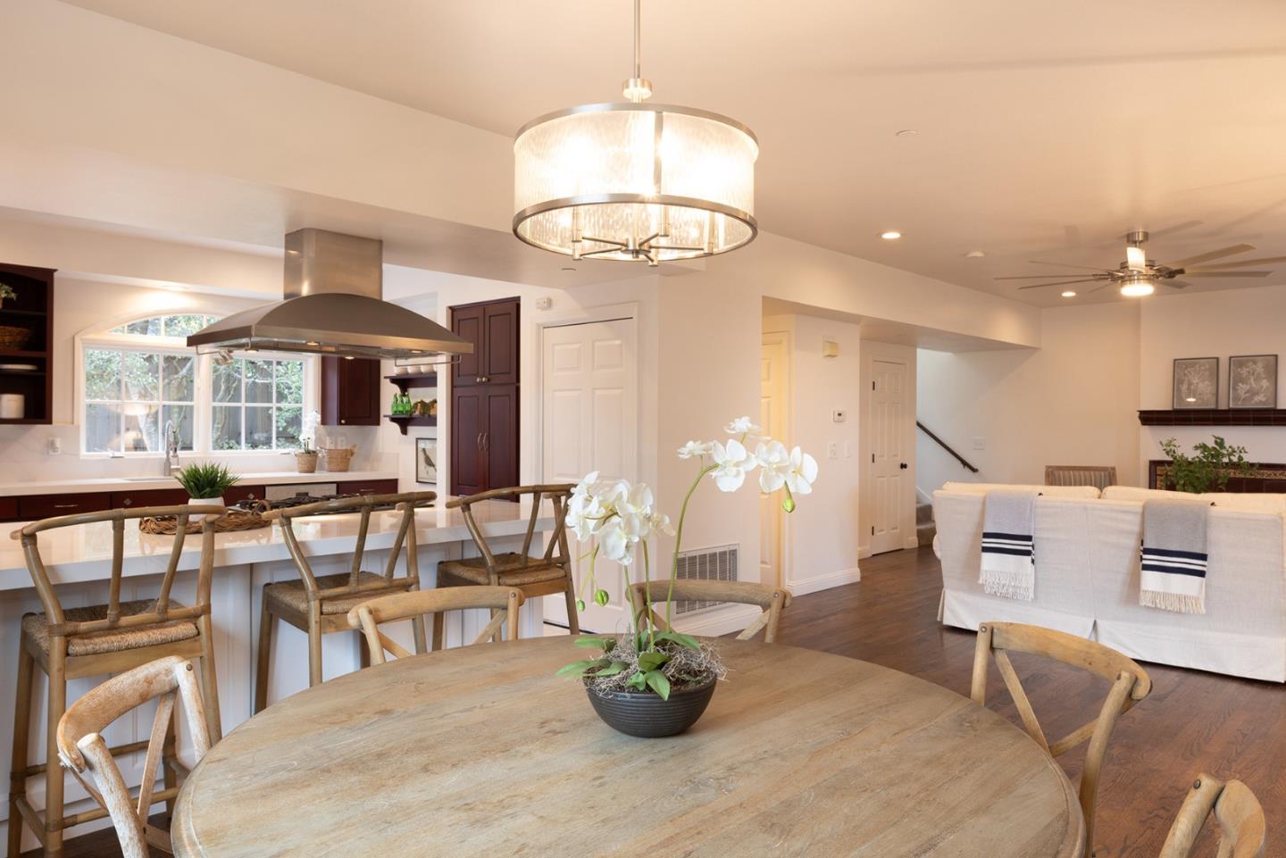 3288 Serra Avenue Carmel, CA 93923 - Photo 14 of 29 a view of a dining room with furniture and a chandelier