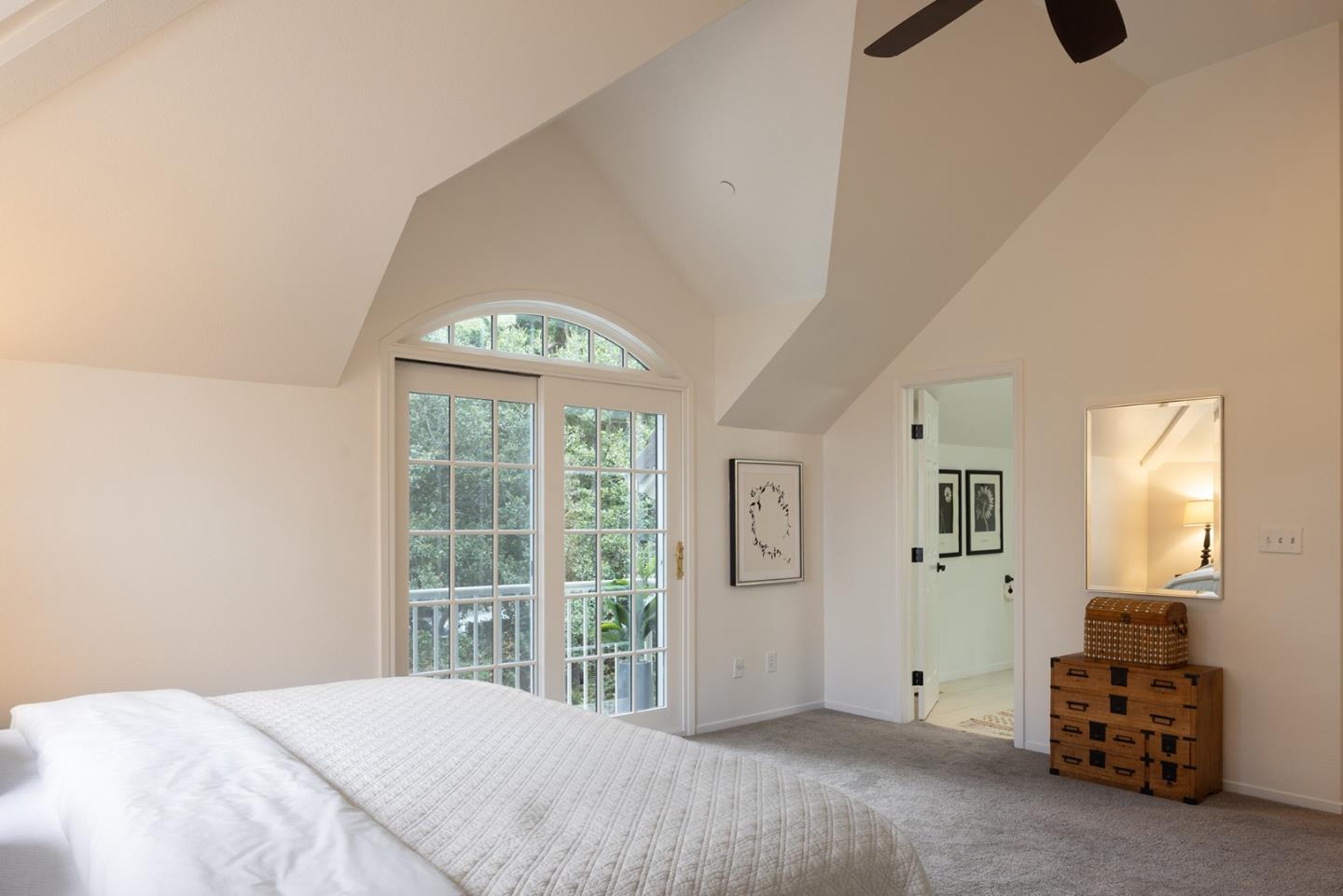 3288 Serra Avenue Carmel, CA 93923 - Photo 19 of 29 a bedroom with a bed and a window