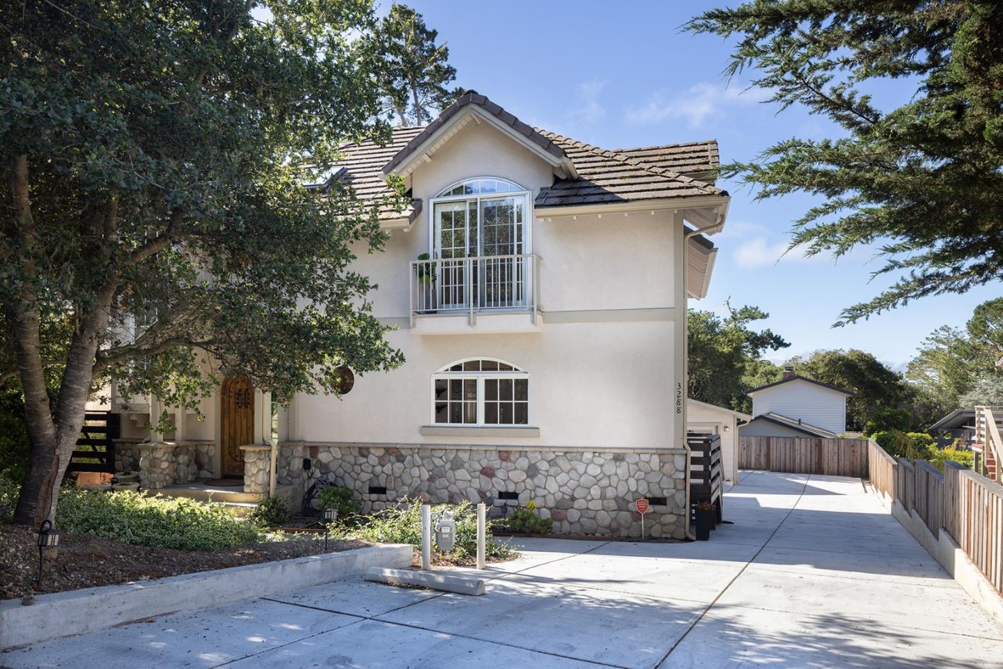 3288 Serra Avenue Carmel, CA 93923 - Photo 2 of 29 front view of a house with a yard