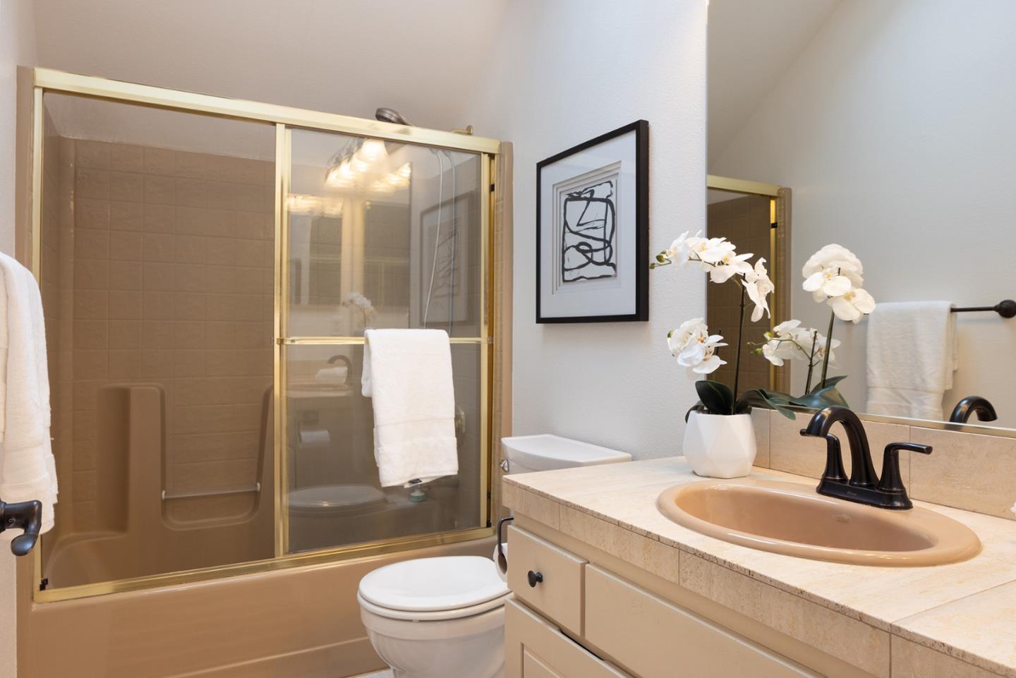 3288 Serra Avenue Carmel, CA 93923 - Photo 23 of 29 a bathroom with a sink a toilet and shower