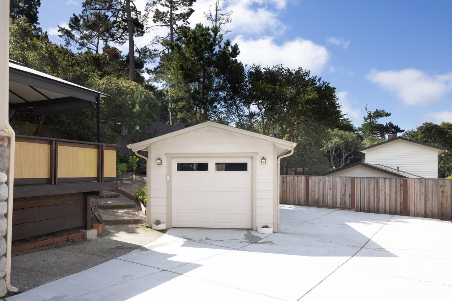 3288 Serra Avenue Carmel, CA 93923 - Photo 27 of 29 a view of a house with a yard and wooden fence