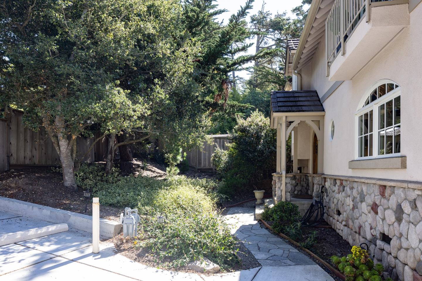 3288 Serra Avenue Carmel, CA 93923 - Photo 29 of 29 a backyard of a house with lots of green space