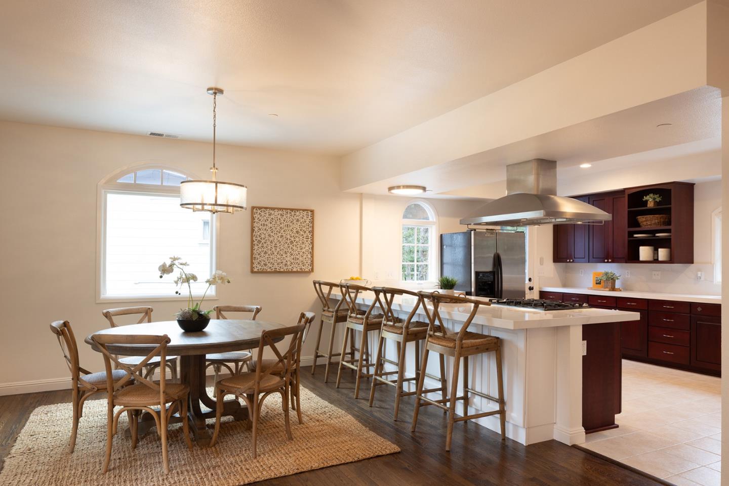 3288 Serra Avenue Carmel, CA 93923 - Photo 6 of 29 a view of a dining room with furniture window and wooden floor