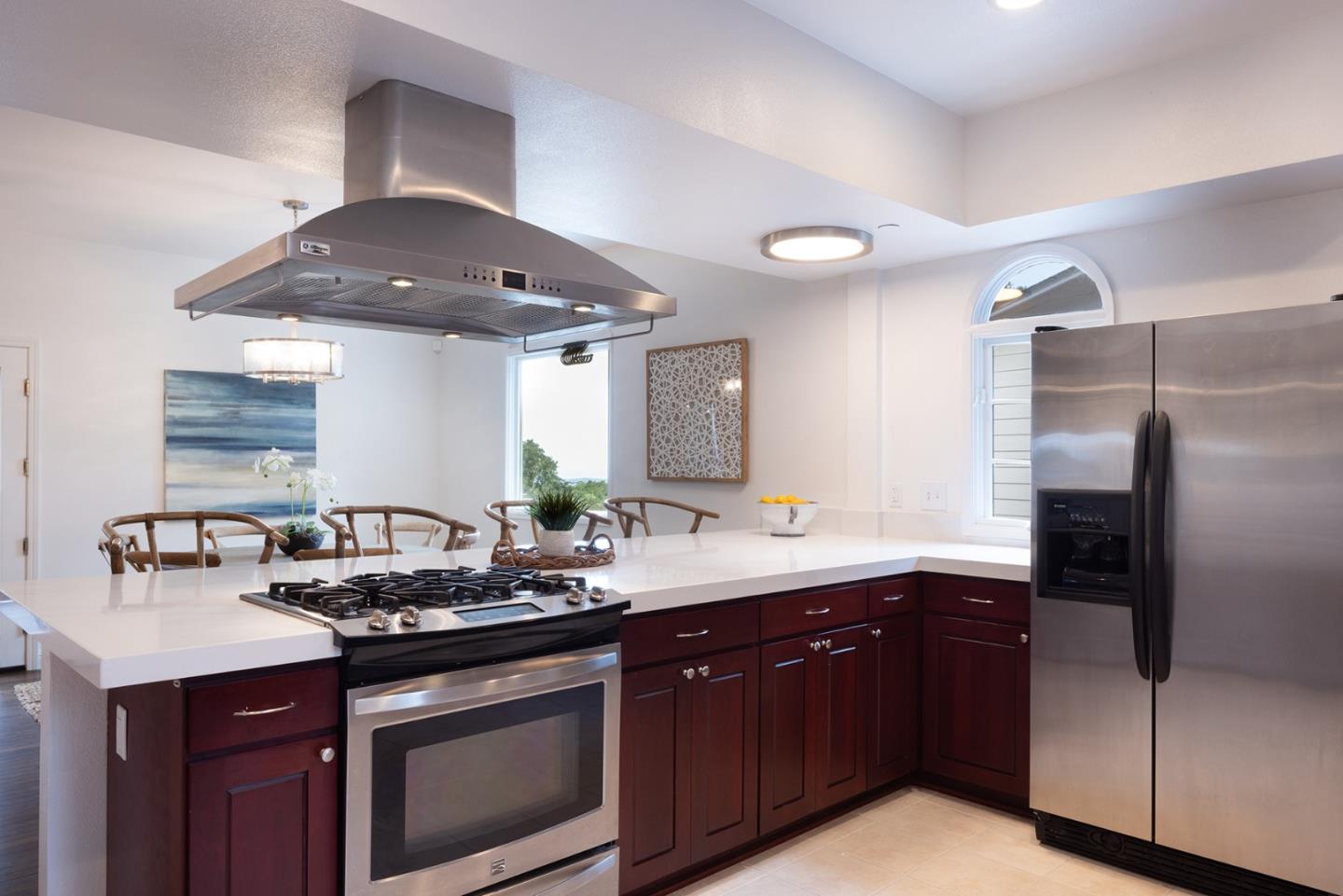 3288 Serra Avenue Carmel, CA 93923 - Photo 8 of 29 a kitchen with stainless steel appliances a sink and a stove