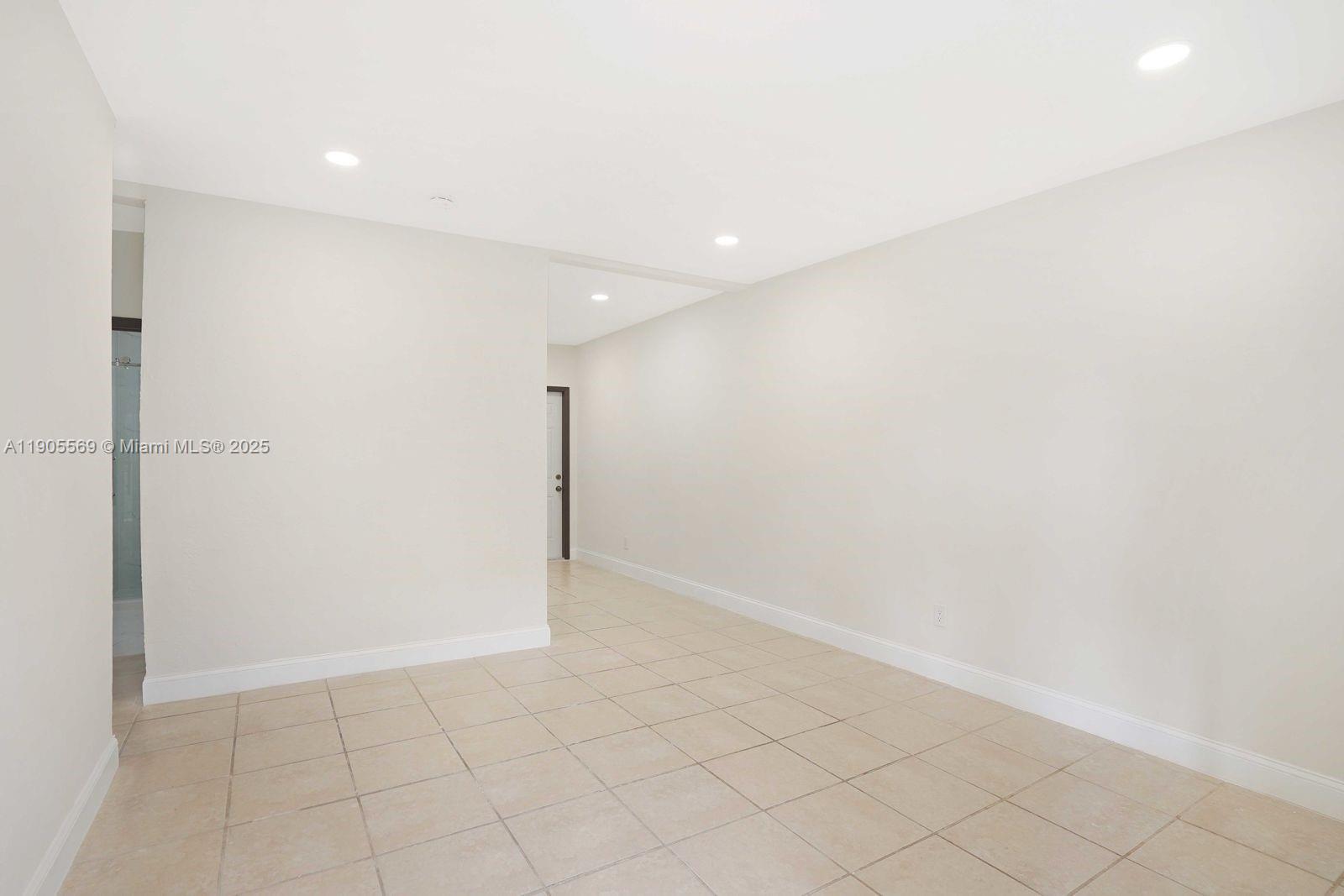 502 Northwest 7th Court, Unit 2 Hallandale Beach, FL 33009 - Photo 16 of 19 a view of an empty room