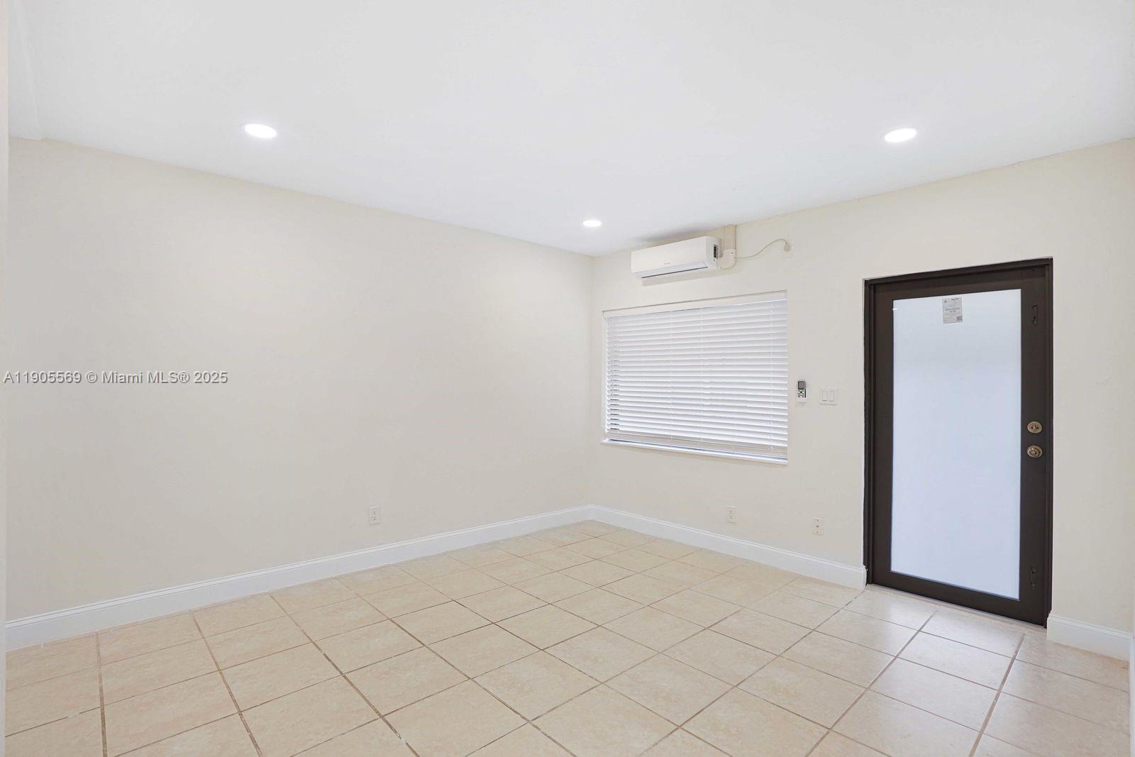 502 Northwest 7th Court, Unit 2 Hallandale Beach, FL 33009 - Photo 17 of 19 a view of an empty room
