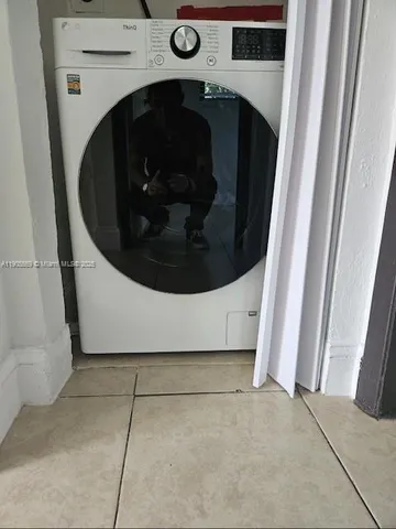 a utility room with a washer and dryer