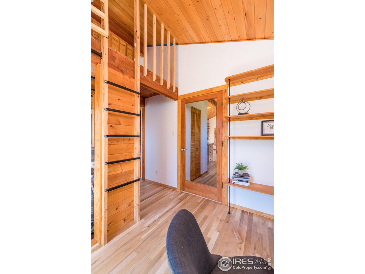 112 Deer Trail Road Boulder, CO 80302 - Photo 22 of 34 a view of living room with furniture and wooden floor