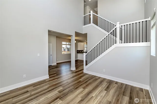 a view of entryway with wooden floor