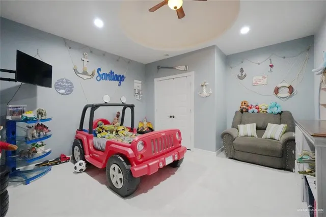 a bedroom with furniture and a couch