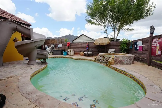 a bedroom with bed and a window