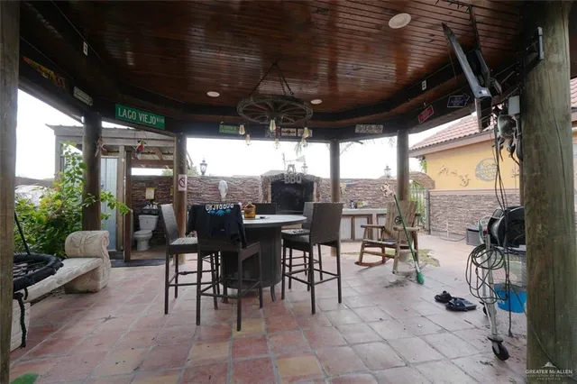 a large bathroom with a large tub and shower