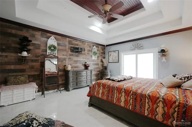 a bedroom with a bed and a walk in closet