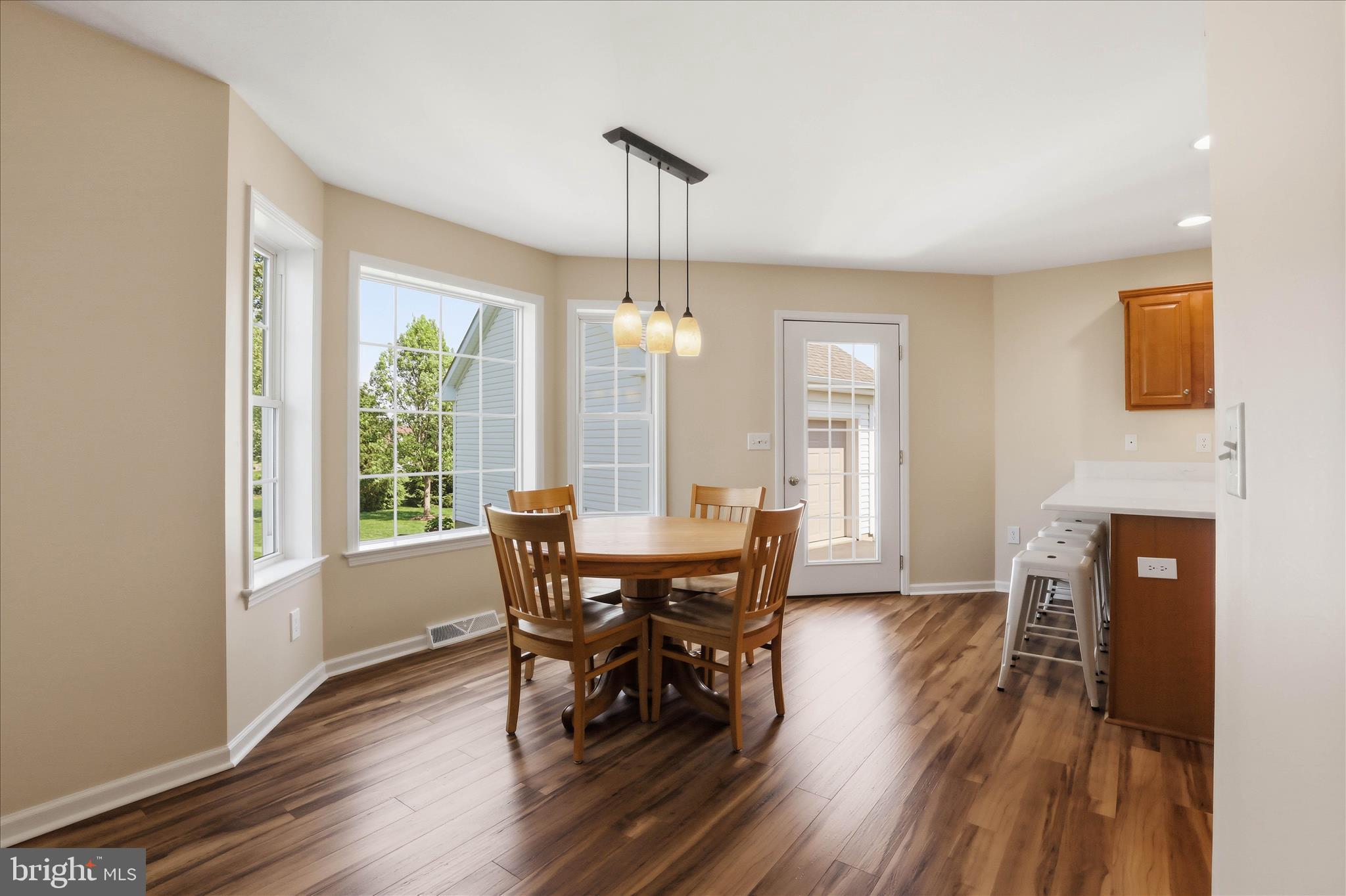 533 Thornberry Lane Lititz, PA 17543 - Photo 10 of 56 a view of a dining room with furniture window and wooden floor