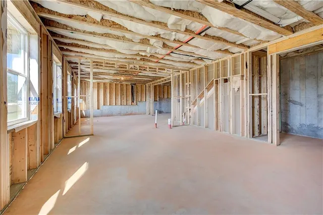 a view of a room with wooden walls