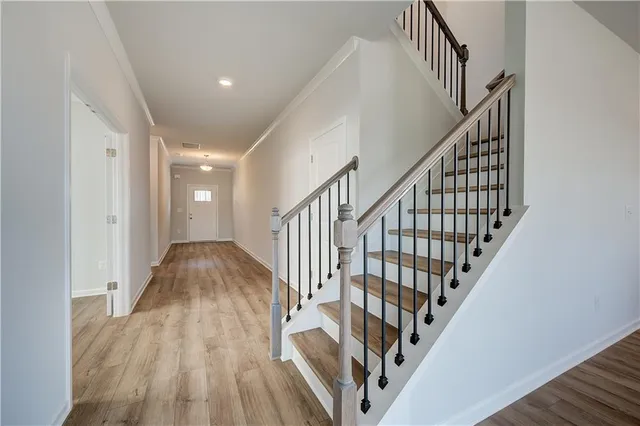 a view of entryway with wooden floor