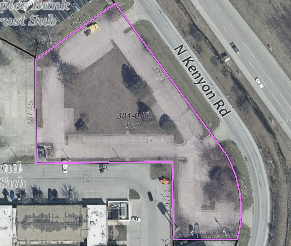 a utility room with dryer and baby