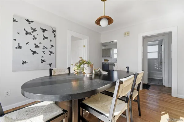 a kitchen that has a sink and a stove in it