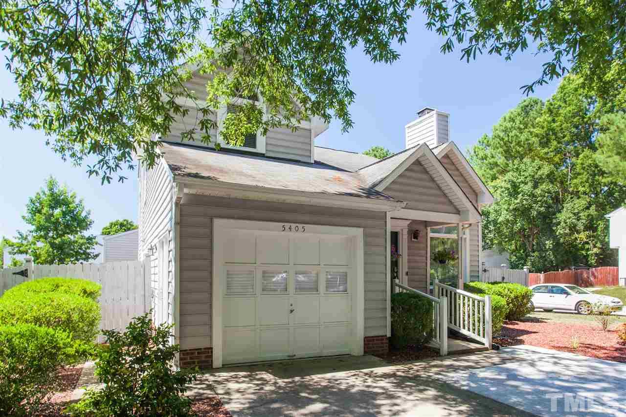 5405 Spring Pines Way Raleigh, NC 27616 - Photo 3 of 30 a front view of a house with garden