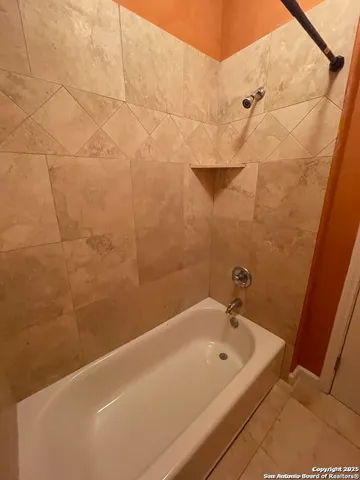 a bathroom with a bathtub
