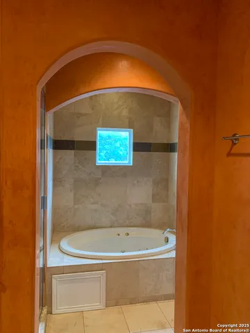 a bathroom with a tub