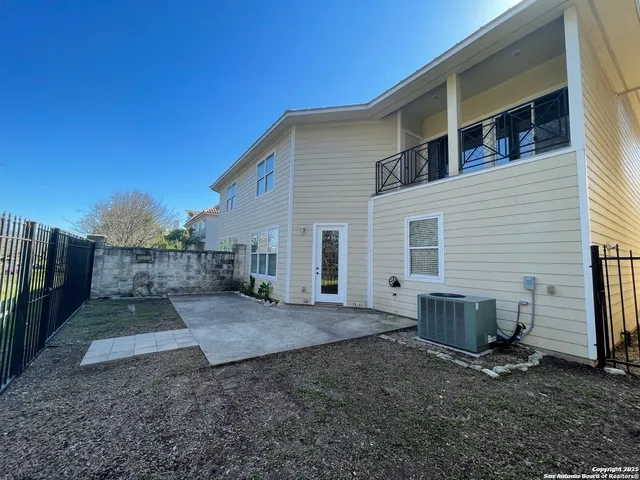 a view of a park with large trees