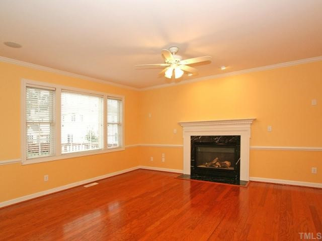 310 Banningford Road Cary, NC 27518 - Photo 4 of 12 Gas Log Fireplace....Beautiful Hardwoods.....Great Place to Hang Out! Den/Family/Great Room