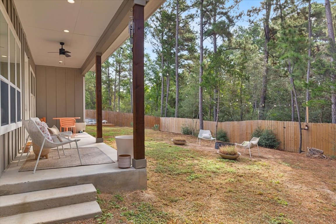 133 Lake Point Way Bastrop, TX 78602 - Photo 30 of 34 a view of backyard with a patio
