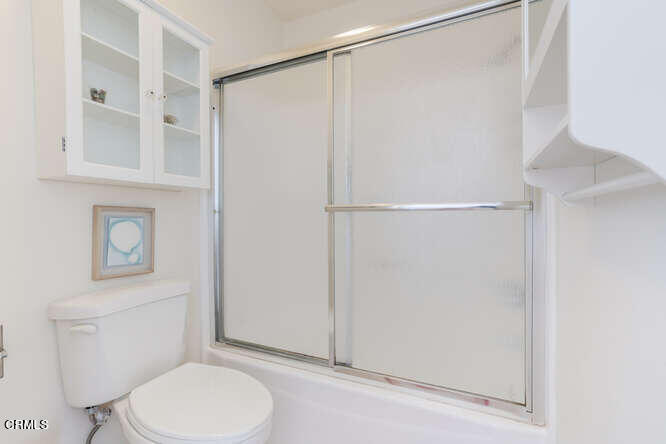 2901 Peninsula Road, Unit 351 Oxnard, CA 93035 - Photo 12 of 45 a bathroom with a toilet and a shower
