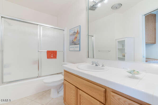 2901 Peninsula Road, Unit 351 Oxnard, CA 93035 - Photo 16 of 45 a bathroom with a sink a toilet and shower