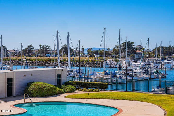 2901 Peninsula Road, Unit 351 Oxnard, CA 93035 - Photo 19 of 45 a view of a lake with boats and large trees