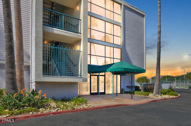 2901 Peninsula Road, Unit 351 Oxnard, CA 93035 - Photo 31 of 45 a view of a chair and table in the patio of a house