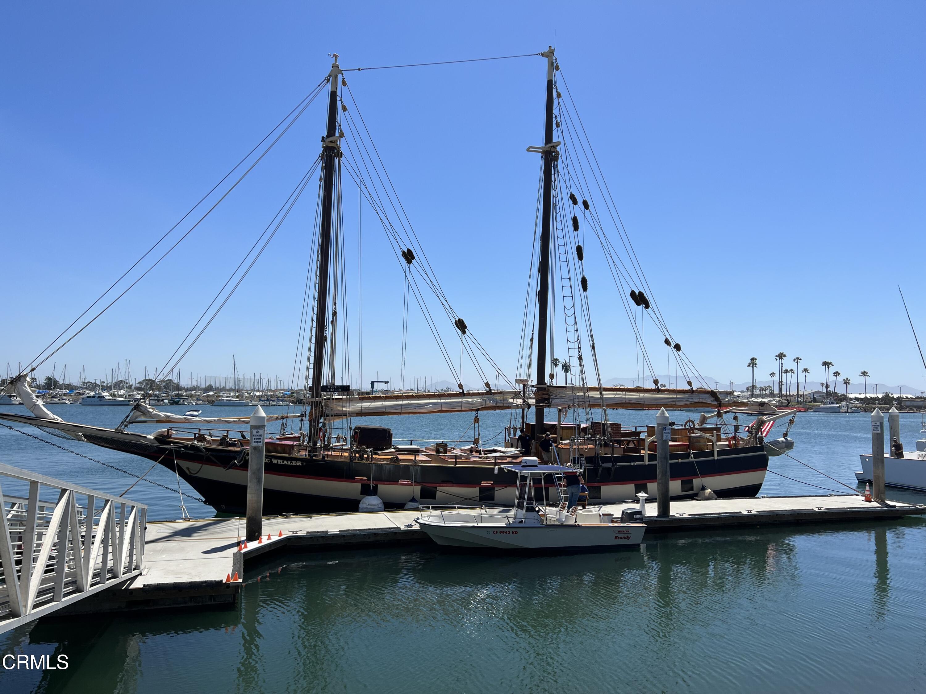 2901 Peninsula Road, Unit 351 Oxnard, CA 93035 - Photo 35 of 45 a view of a lake with boats next to a bridge