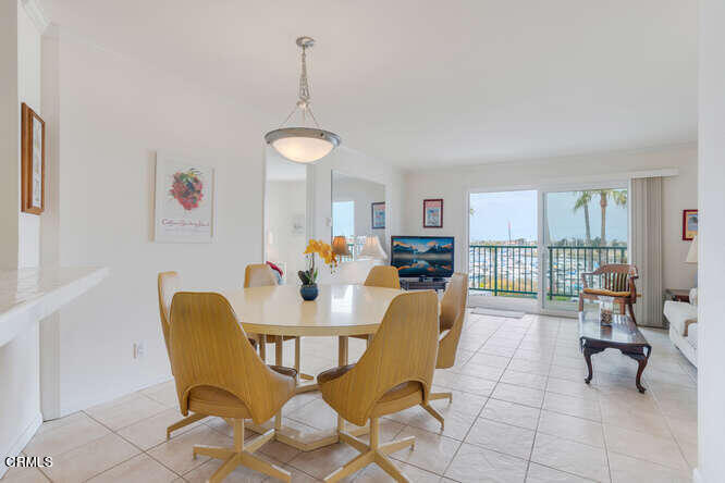 2901 Peninsula Road, Unit 351 Oxnard, CA 93035 - Photo 5 of 45 a view of a dining room with furniture window and outside view