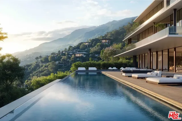 a view of swimming pool with outdoor seating and plants