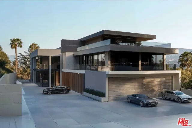 a front view of a house with parking