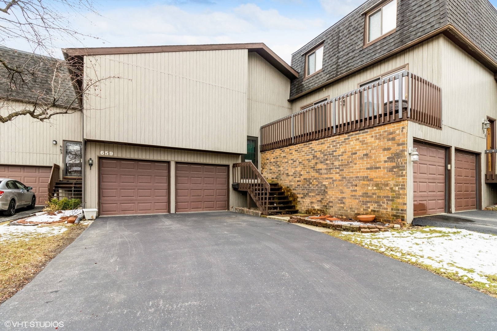 a view of a house with a garage