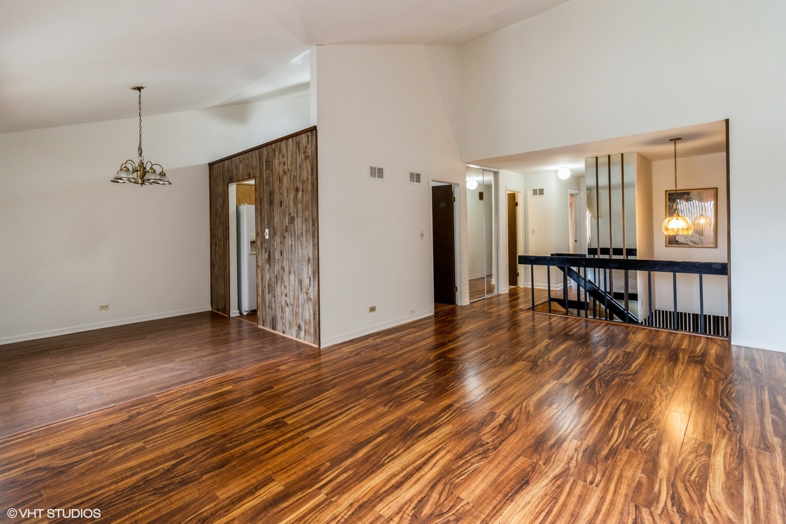 659 High Ridge Road Roselle, IL 60172 - Photo 4 of 16 a view of a room with wooden floor fireplace and windows