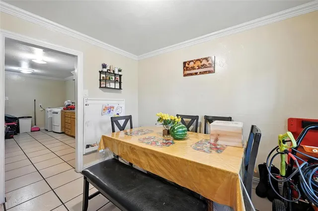 a dining room with furniture and a table