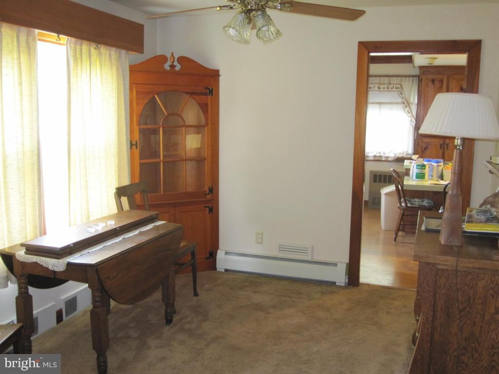 971 Letort Road Washington Boro, PA 17582 - Photo 14 of 29 a room that has a bed and a table in it