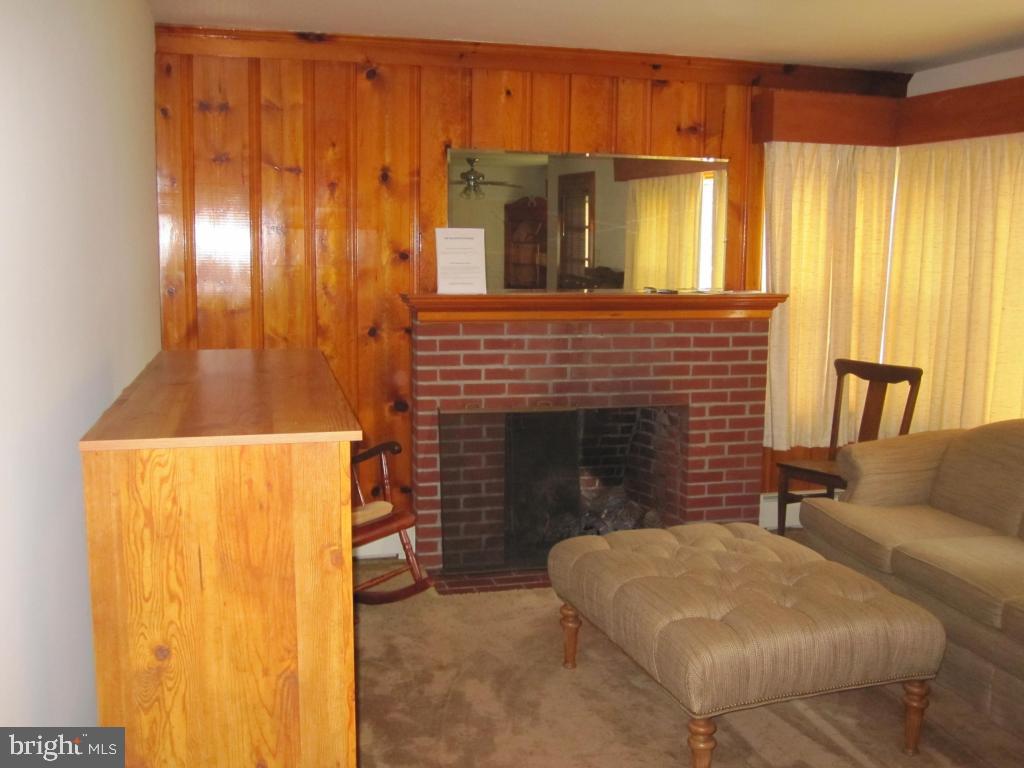 971 Letort Road Washington Boro, PA 17582 - Photo 16 of 29 a living room with furniture and a fireplace