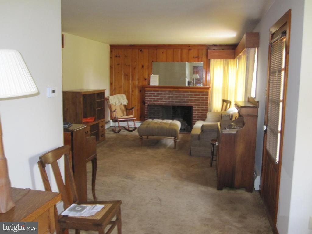 971 Letort Road Washington Boro, PA 17582 - Photo 18 of 29 a living room with furniture and a fireplace