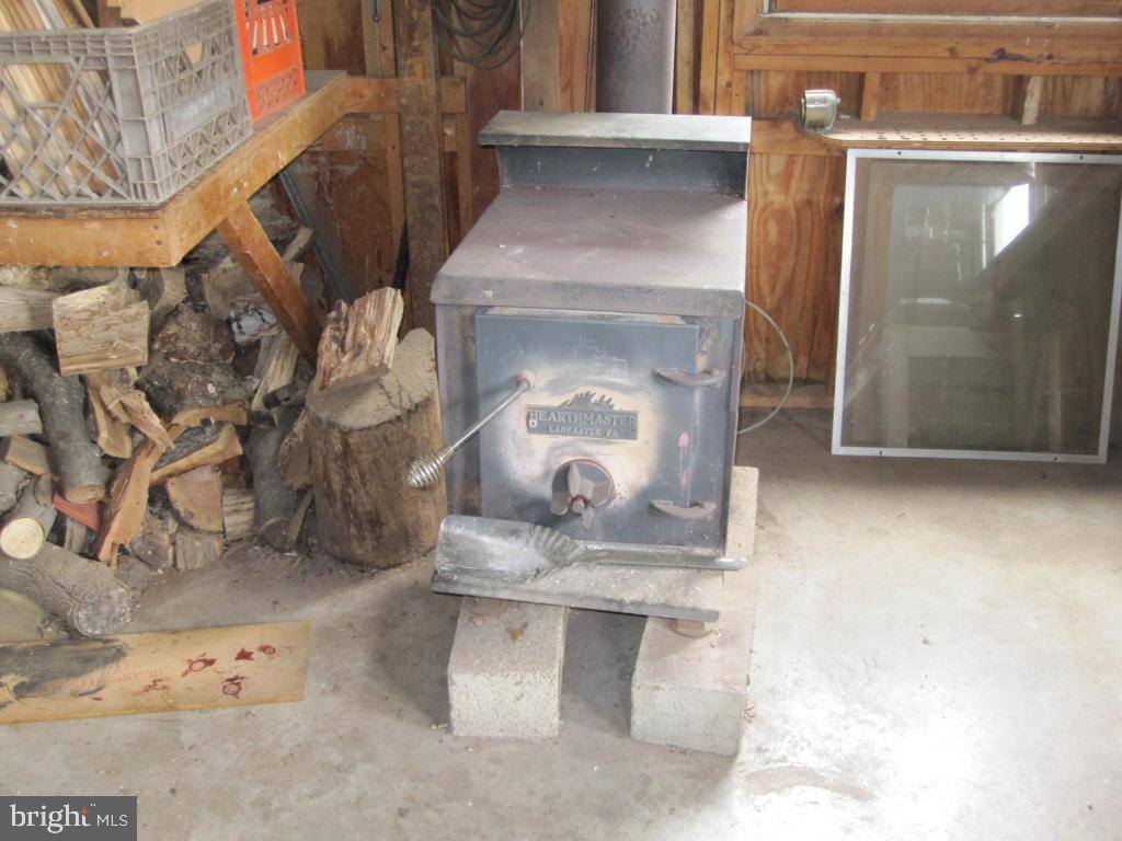 971 Letort Road Washington Boro, PA 17582 - Photo 26 of 29 a fireplace with a mirror