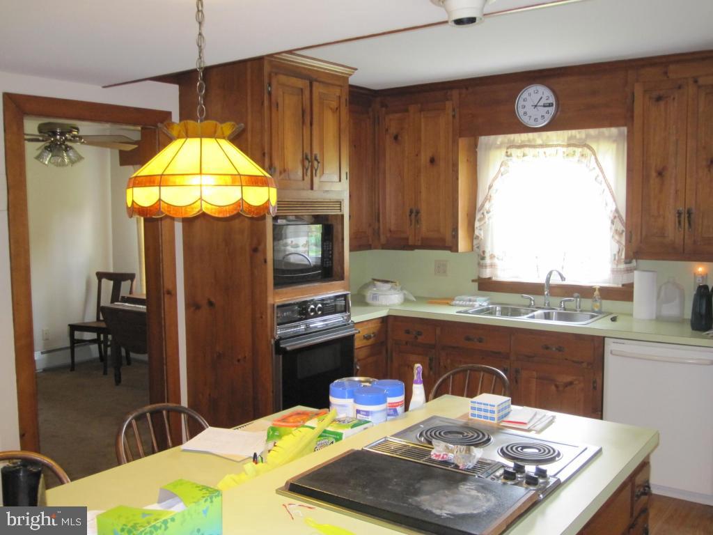 971 Letort Road Washington Boro, PA 17582 - Photo 7 of 29 a kitchen with a table and chairs in it