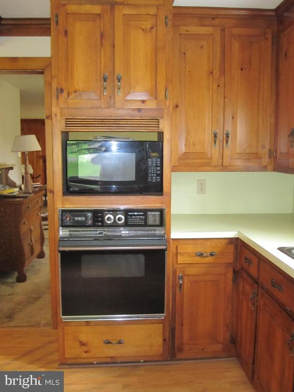 971 Letort Road Washington Boro, PA 17582 - Photo 9 of 29 a kitchen with granite countertop a stove and a sink