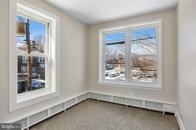a view of an empty room and window