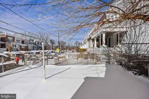 a picture of a bench in front of a door