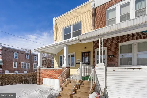 a view of a brick building with many windows