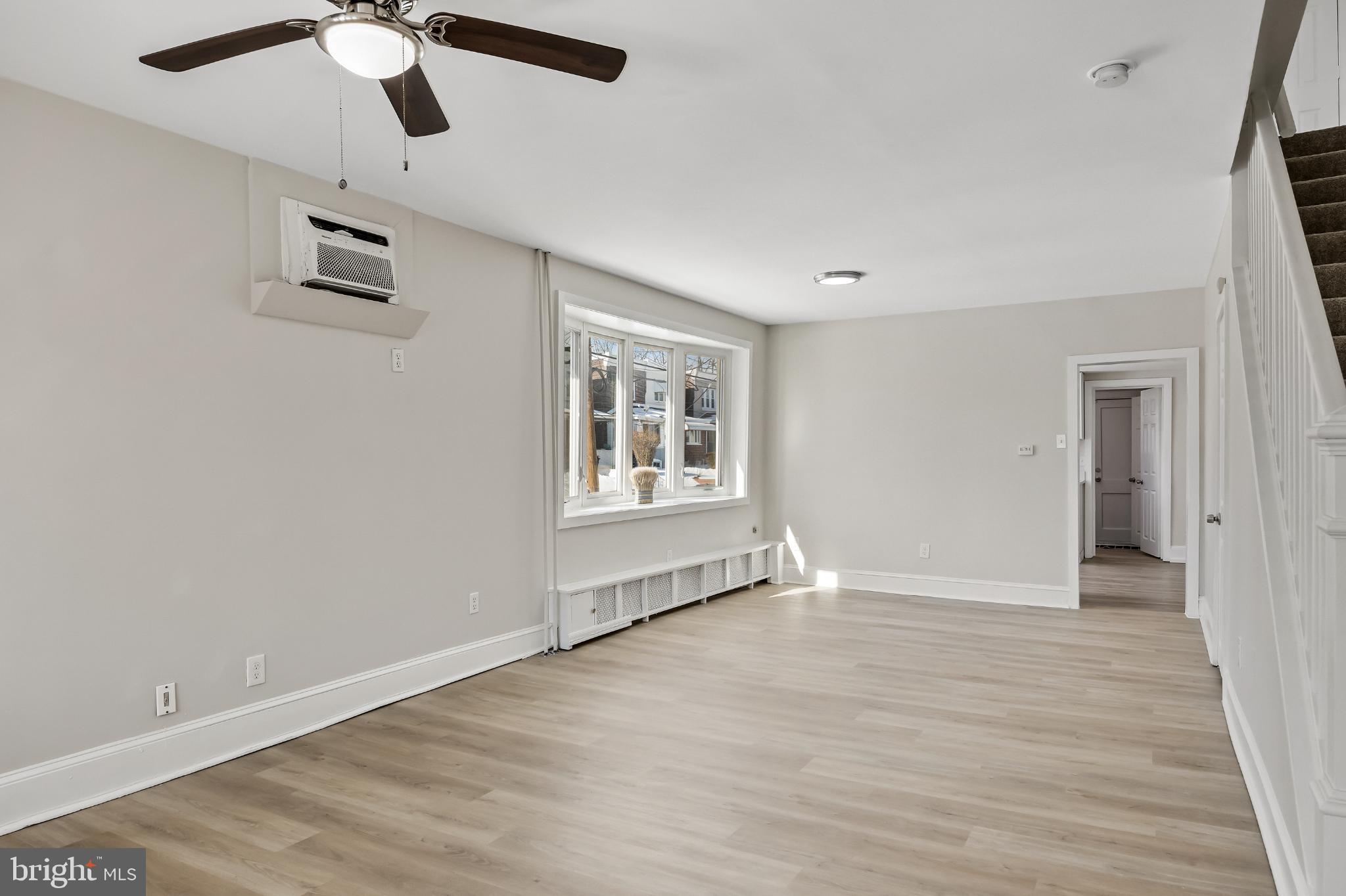 720 West 11th Street Chester, PA 19013 - Photo 8 of 33 wooden floor in an empty room with a window