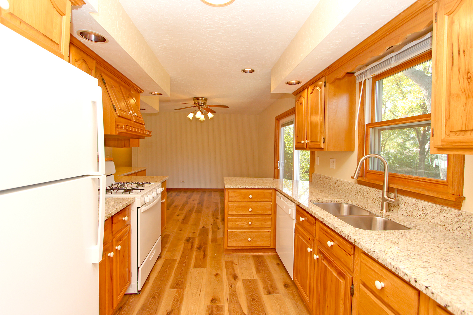 65 Old Mill Grove Road Lake Zurich, IL 60047 - Photo 15 of 29 a spacious bathroom with a granite countertop sink a mirror and a shower